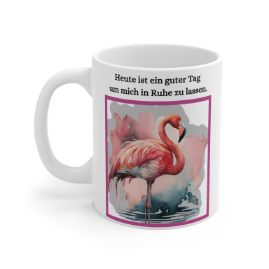 Kaffeetasse mit einem rosa Flamingo und einem bunten Hintergrund.